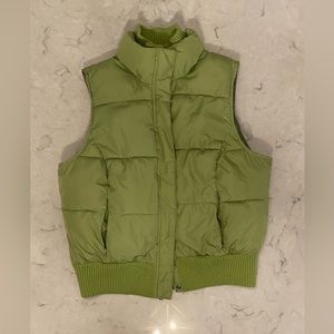 this is a XL green puffer vest, the brand is merona, it is brand new never worn